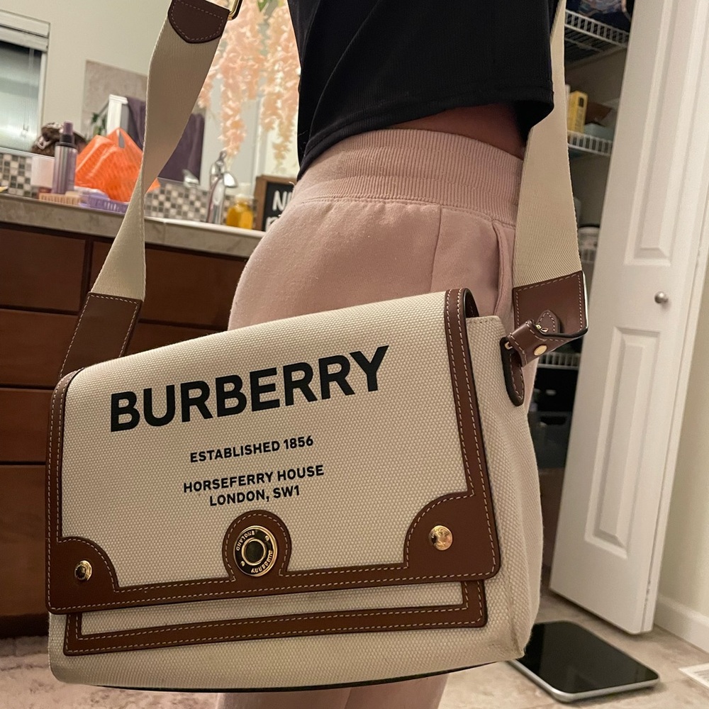 Burberry canvas cross body bag.